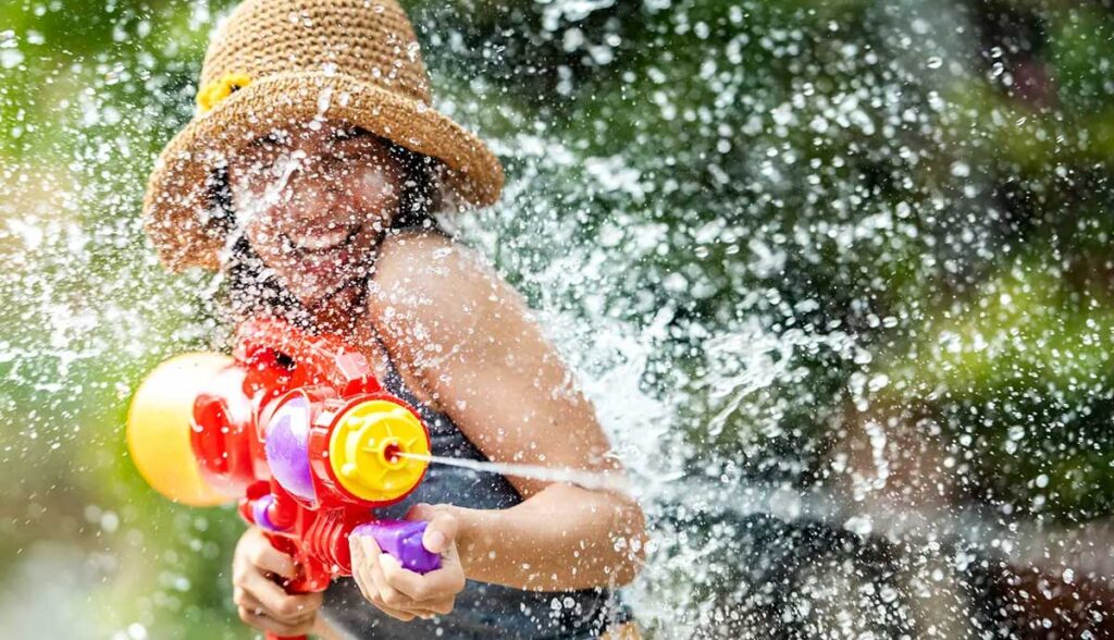 Girl having fun at Songkran | Denz Coworking Phuket